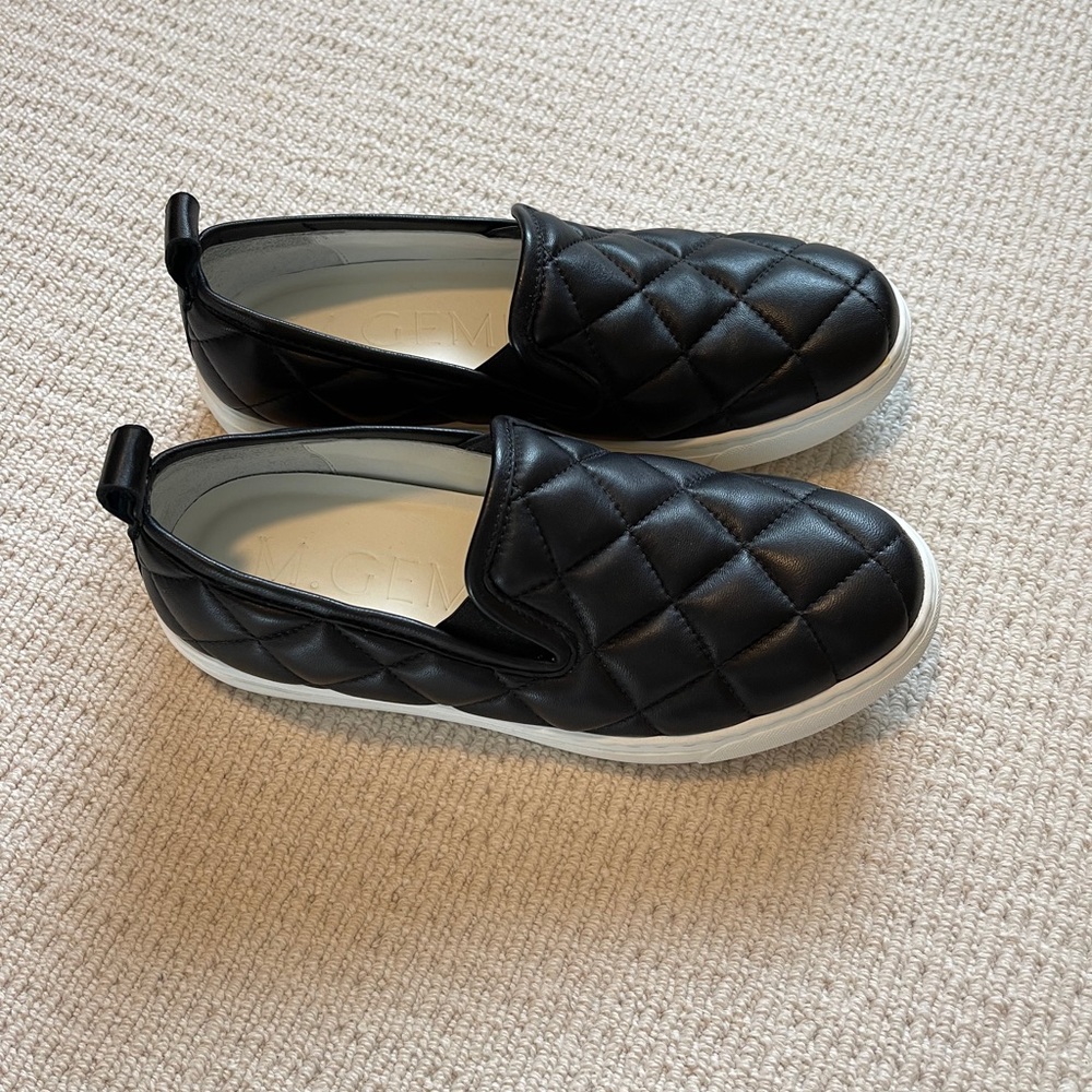 M Gemi black quilted slip ons